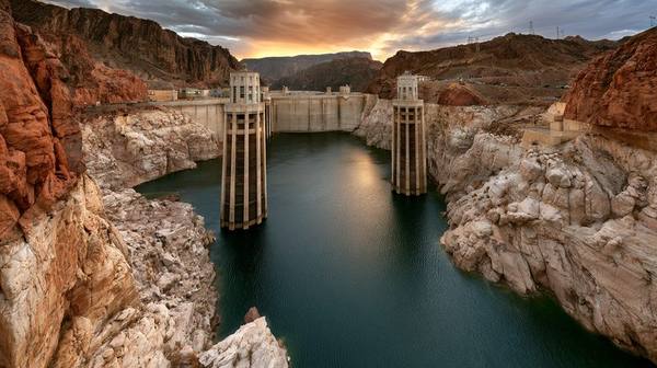 Hoover Dam reservoir with dramatic bathtub ring showing record low water levels in canyon