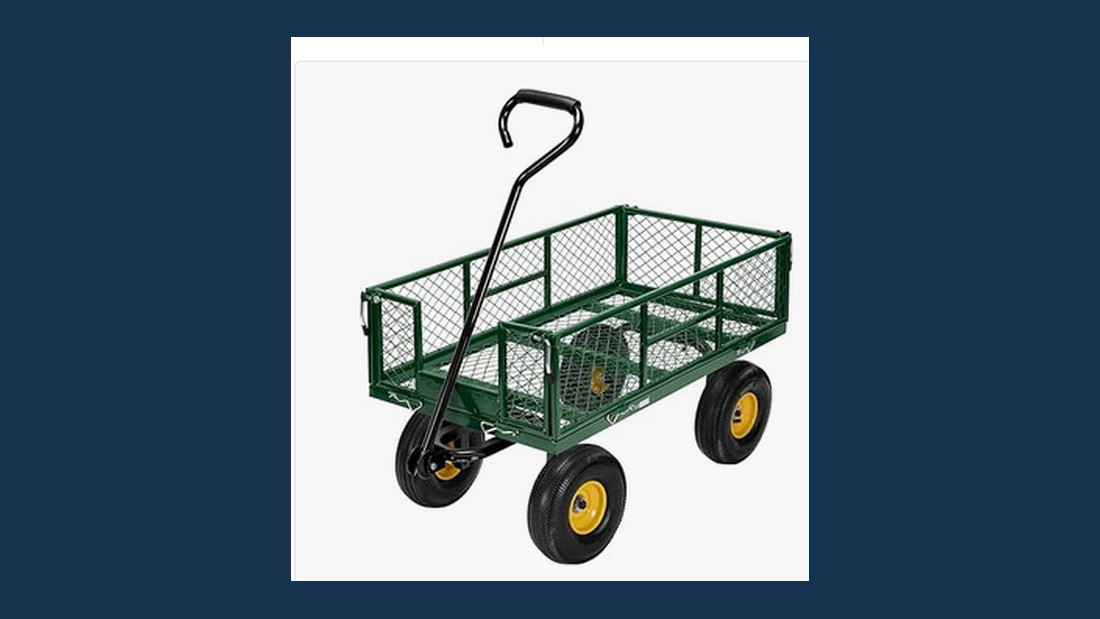 A green steel mesh garden wagon with four drop-down mesh sides, a long pull handle and four large pneumatic tires
